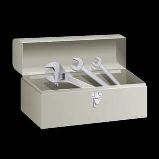 Icon of grey toolbox with tools in three-quarter view